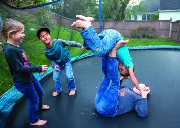 The children of April and Rubin Doster, from left: Savannah, 8, Jackson, 9, Derek, 5 and Mya, 11, play on a trampoline in the backyard of their Palmyra home on Tuesday, Nov. 5, 2019.